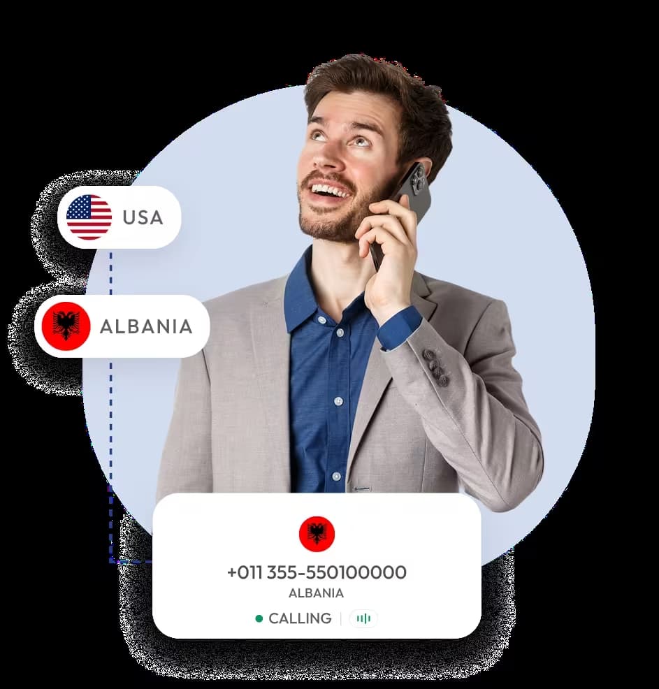  man smiling with a phone on her hand where there is flag of us and albania
