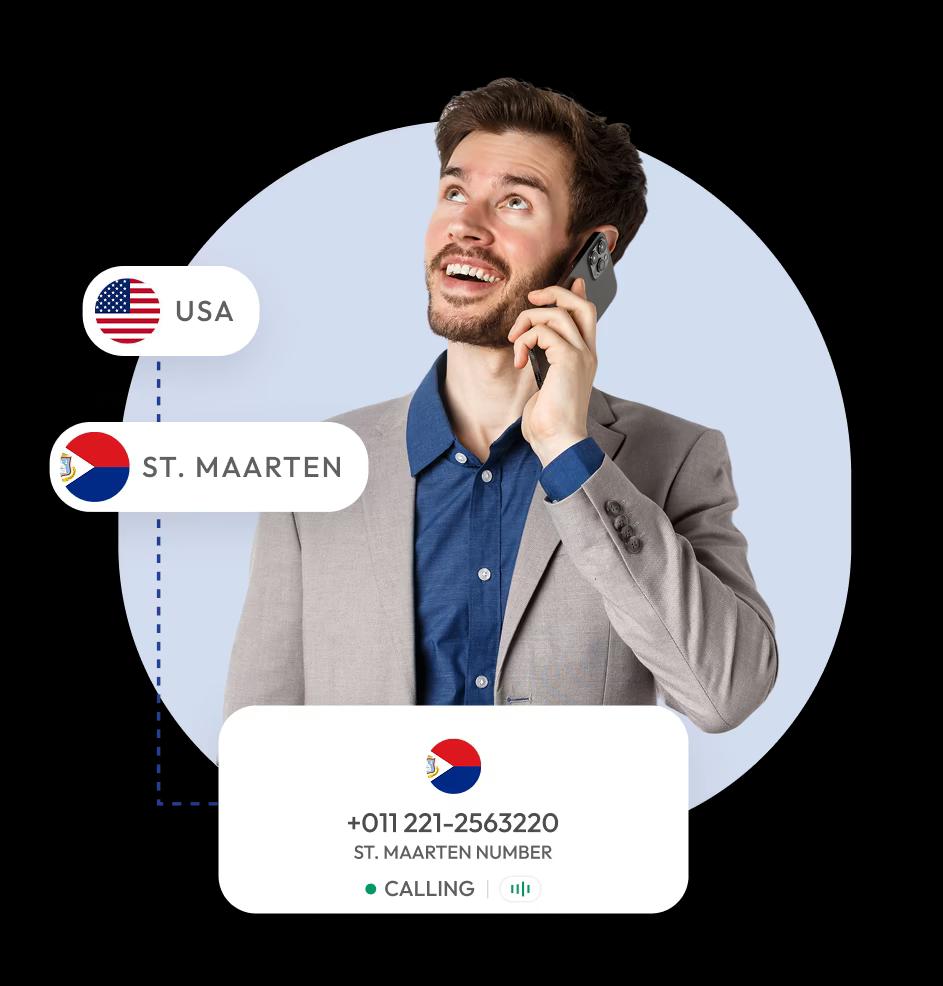 a man smiling with a phone on her hand where there is flag of us and saint maarteen