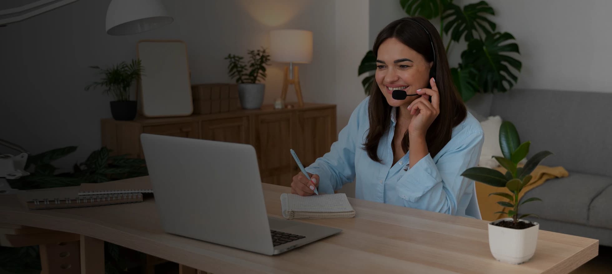 woman on headset working in financial services