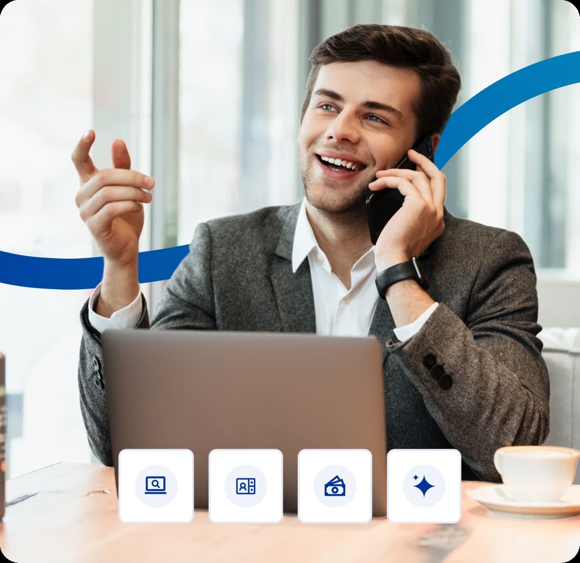 Professional remote worker using a cloud business phone system on a mobile device next to an open laptop