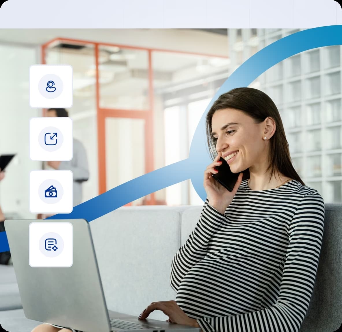 businesswoman managing office tasks on laptop during a phone call.